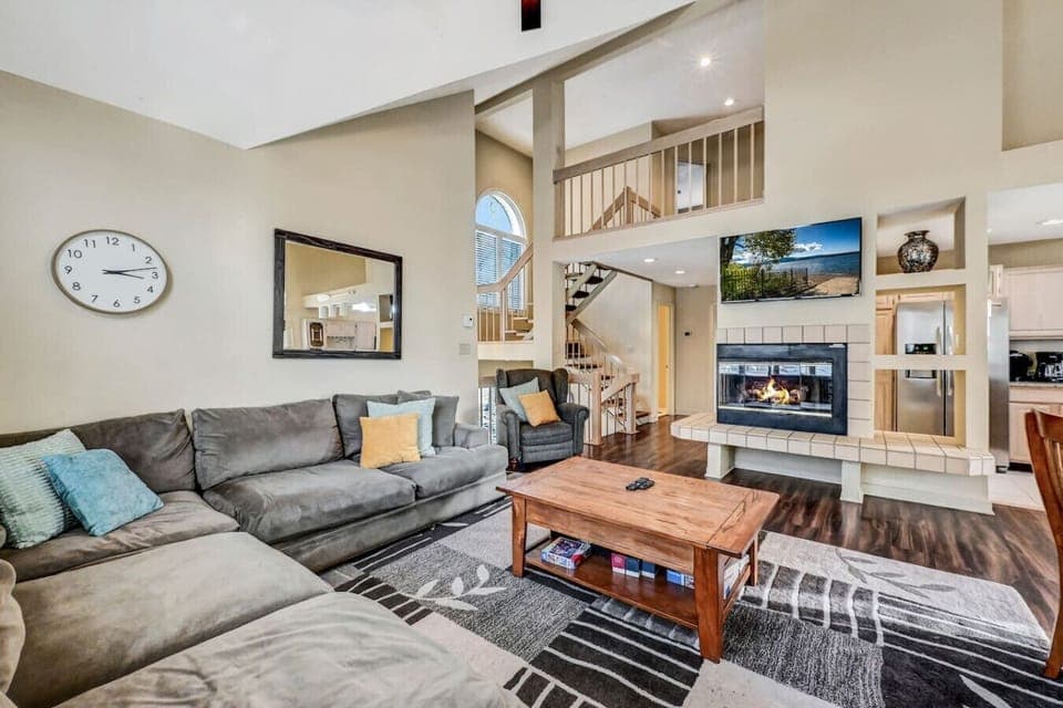 Room for everyone—one of THREE living spaces to spread out and relax