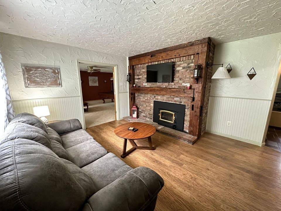 Living room with sleeper sofa, Large Smart TV.