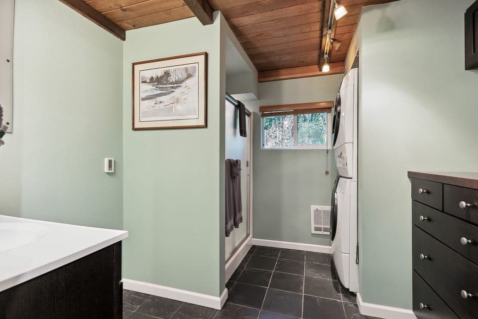 Bathroom has heated floors and a standing shower