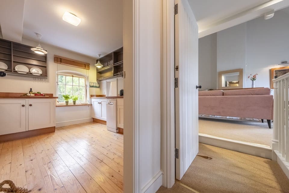 First floor: Through to the next door kitchen