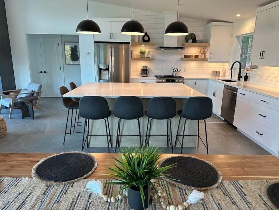 Comfortable seating for 14 around the 8 foot island and live-edge dining table.