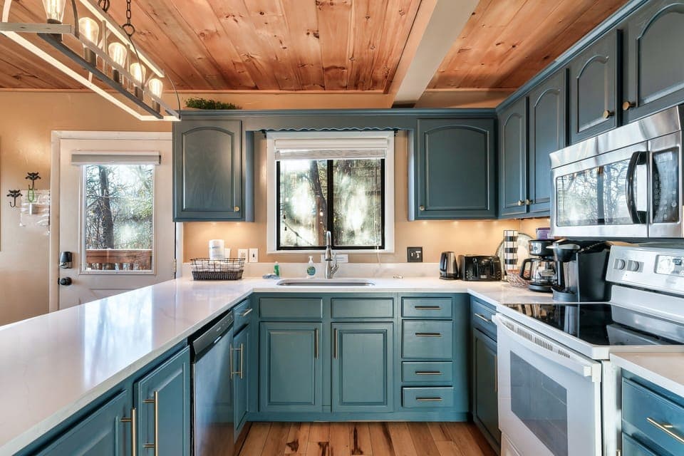 Kitchen is stocked and ready for cooking! Includes Keurig & regular coffee pot.