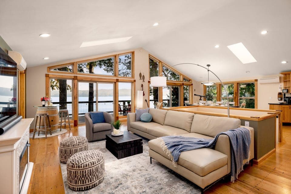 Spacious and cozy living room with an electric fireplace and TV