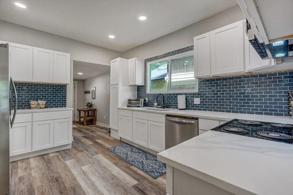 Our Fully Equipped Kitchen Features Beautiful Lighting and Abundant Space