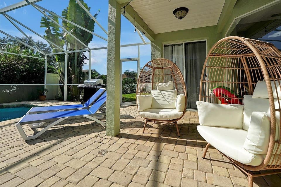Relax on the lanai on lounge chairs, egg chairs, or on the sectional couch