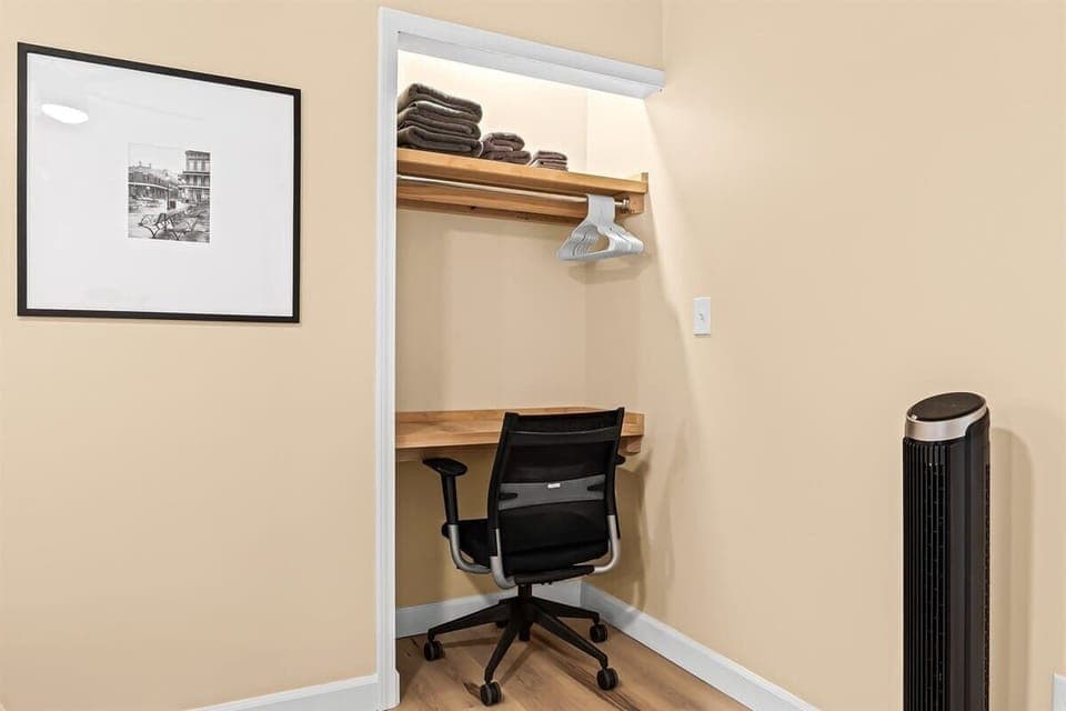 This closet has been transformed into a cozy workspace.