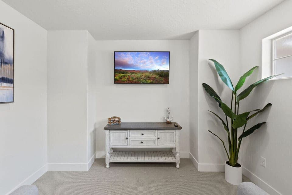 Entertainment Lounge: Relax and unwind with scenic views and a sleek TV for your favorite shows!