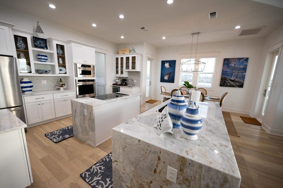 Large custom kitchen with 2 islands and 4 stools 