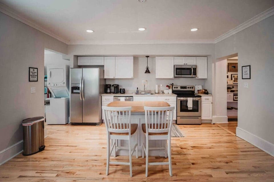 Fully stocked kitchen with dining space for 8.