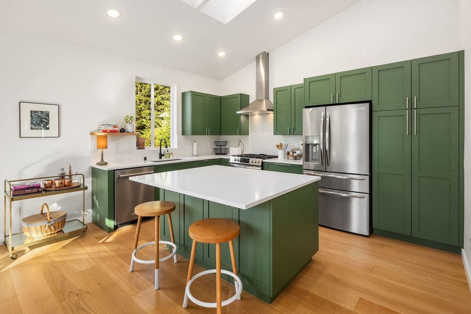 Open concept living, kitchen island and all new appliances. 