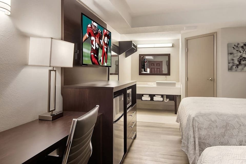 Unit with a flat-screen TV, microwave and mini-fridge