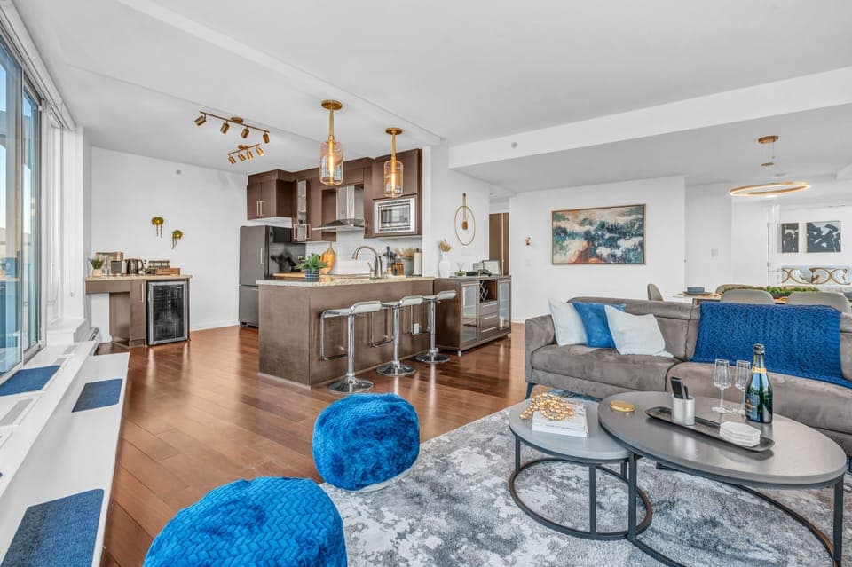 Facing the entrance, living room, and kitchen.