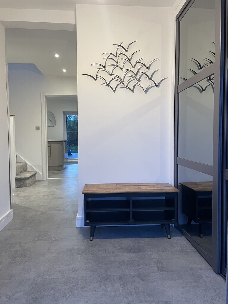 Entrance hallway with large cloaks cupboard