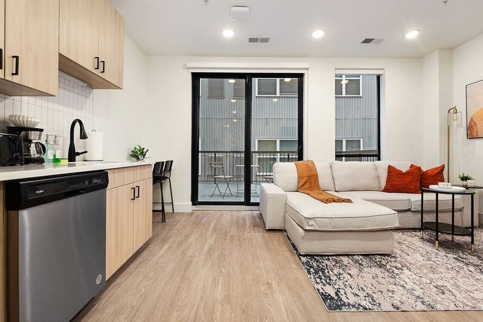 Open Concept Living Room. No Patio in This Unit, Large Windows Instead