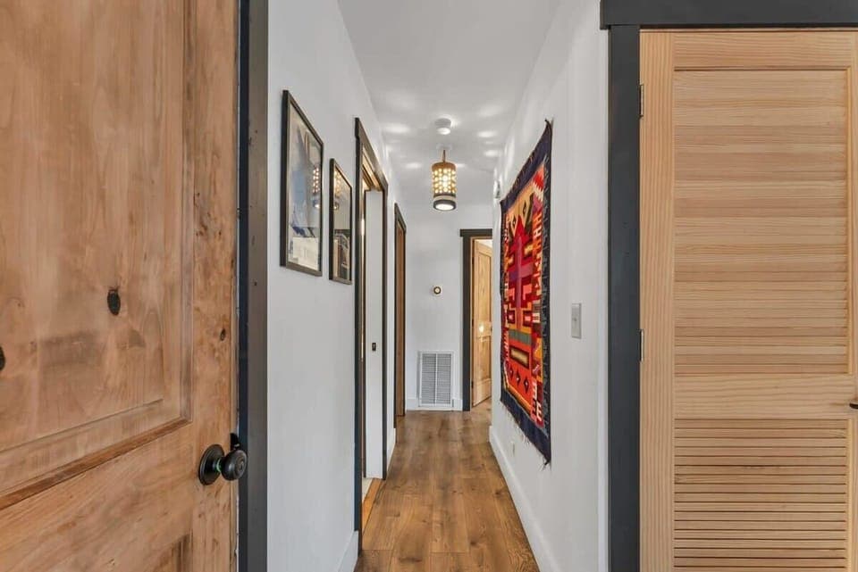 The view heading down the hallway leads to the tranquility of the bedrooms.