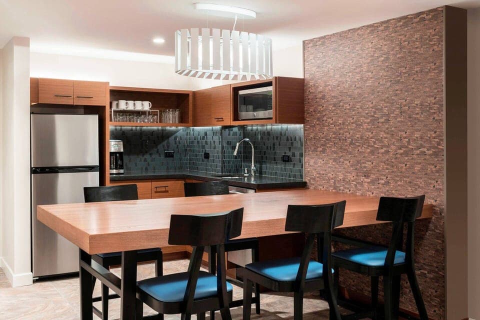 Separate Dining area and Partial Kitchen.  Includes everything except a stove or oven.