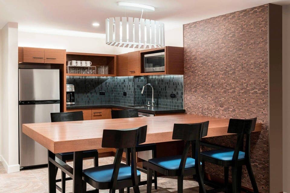 Separate Dining area and Partial Kitchen.  Includes everything except a stove or oven.