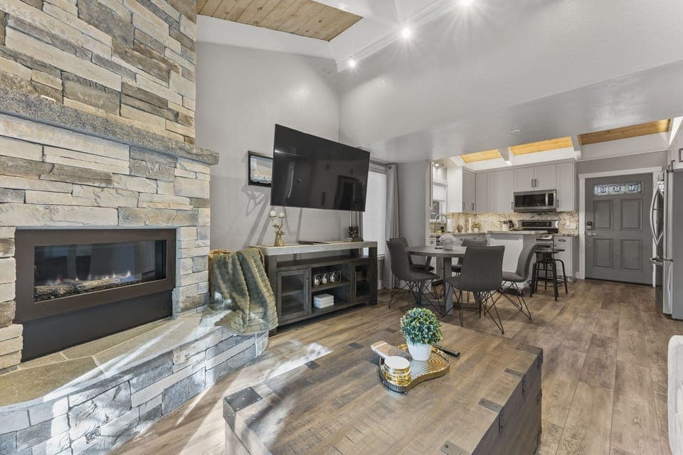 Photo of the living room, dining area, and kitchen
