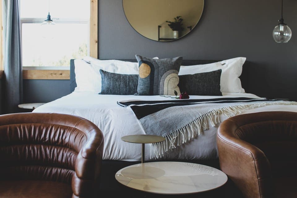 Sink into plush linens and unwind with cozy lounge seating