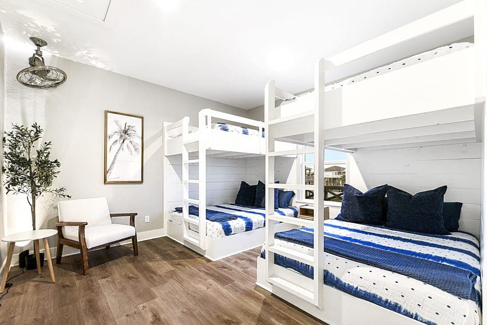 2-Full over Queen Bunk Beds with twin rollaway bed.