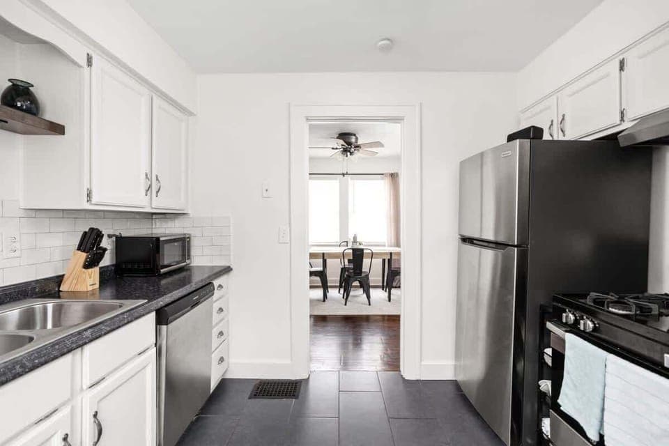 Kitchen: Sleek cabinetry and modern appliances await your culinary adventures in this stylish space!