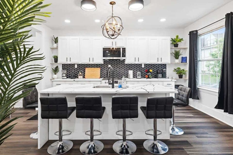 What's a home without a widely welcoming kitchen with chic seaters.
Bask in this beauty!