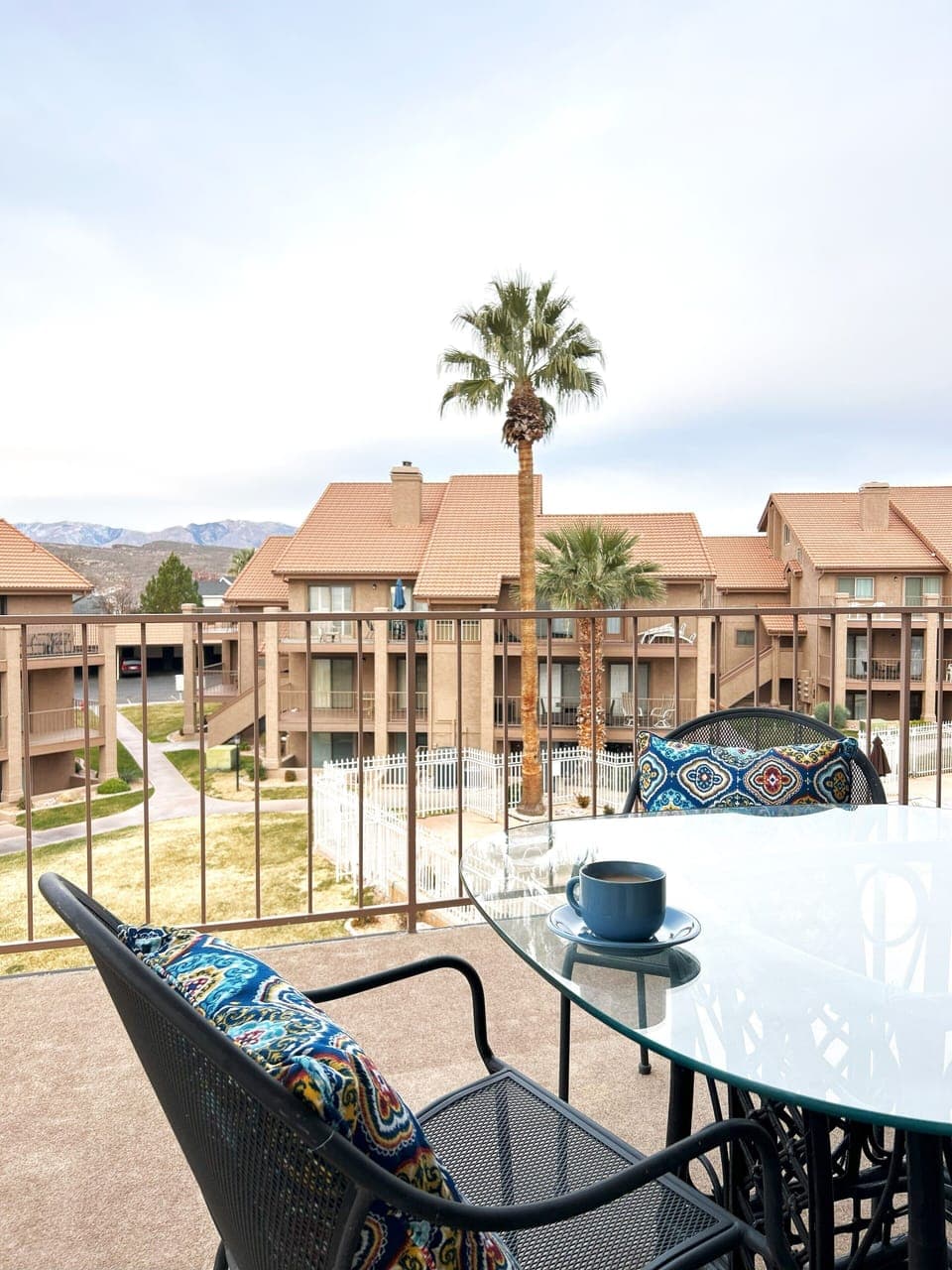 Daytime view from balcony, beautiful palm trees and mountain view