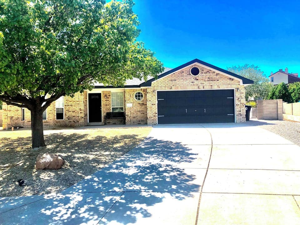 Front of house with 2 car garage and driveway parking