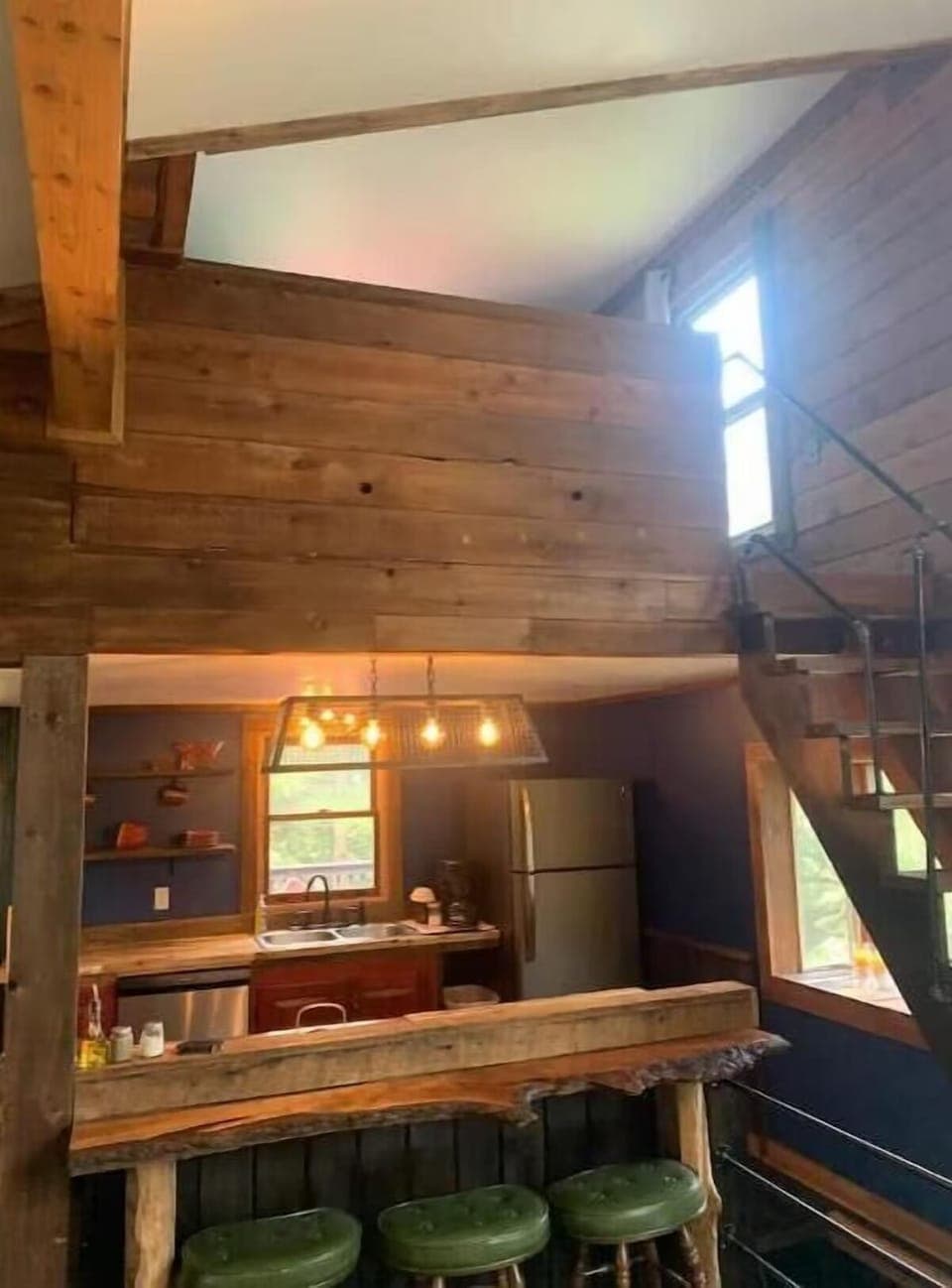 Bar view from living room 1 into kitchen/loft