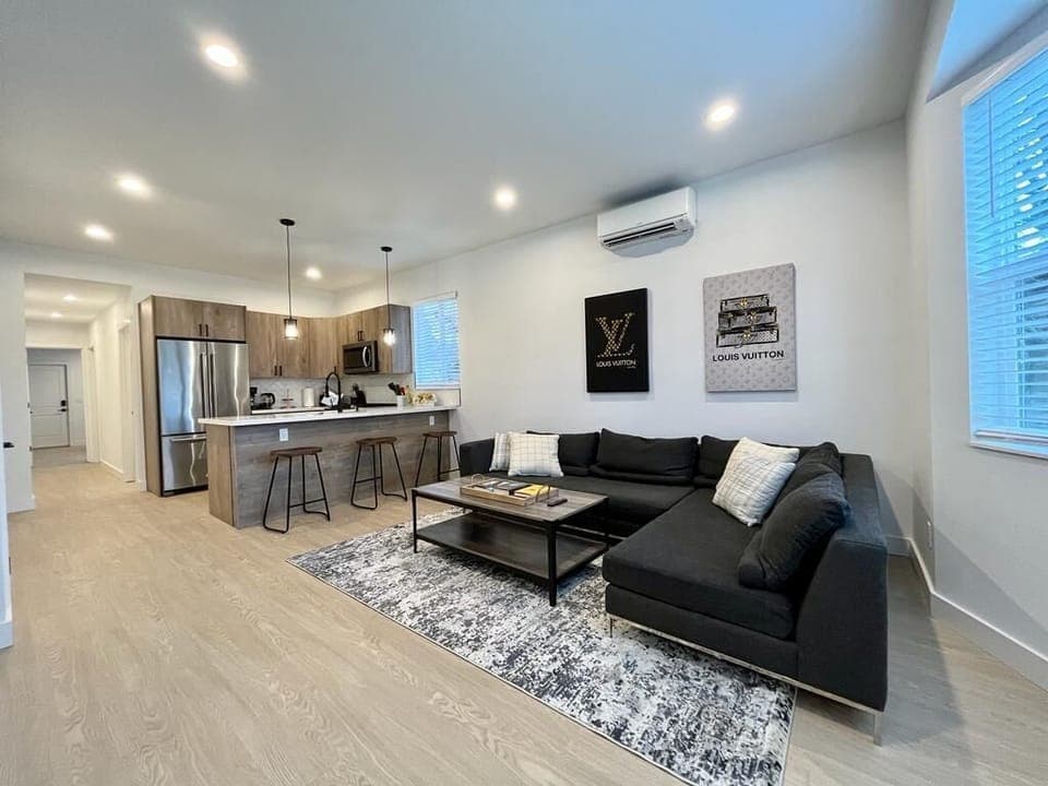 Living area seamlessly blends with a countertop-turned-island.