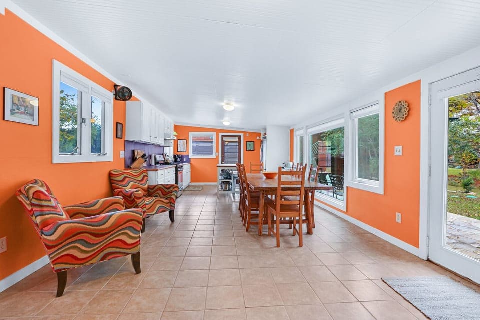 Additional sofa chair seating along the dining room