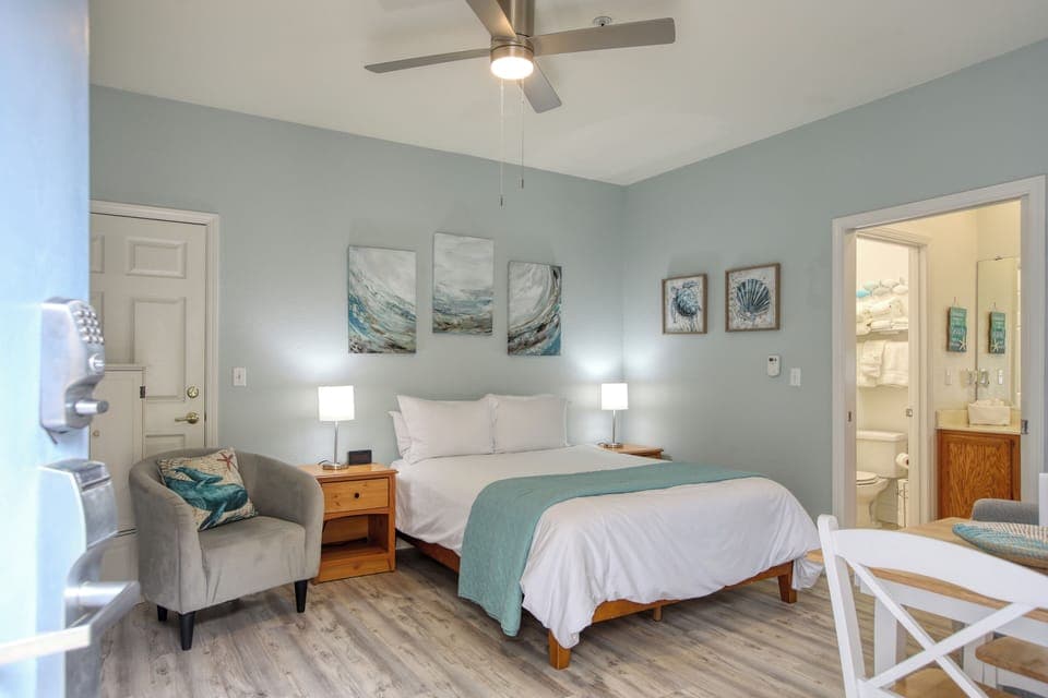 Welcome to Coastal Gem, Unit 505! This cozy downstairs studio features a comfy queen bed and a compact kitchenette—perfect for your seaside escape.