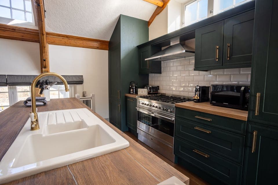 The kitchen has been recently refurbished