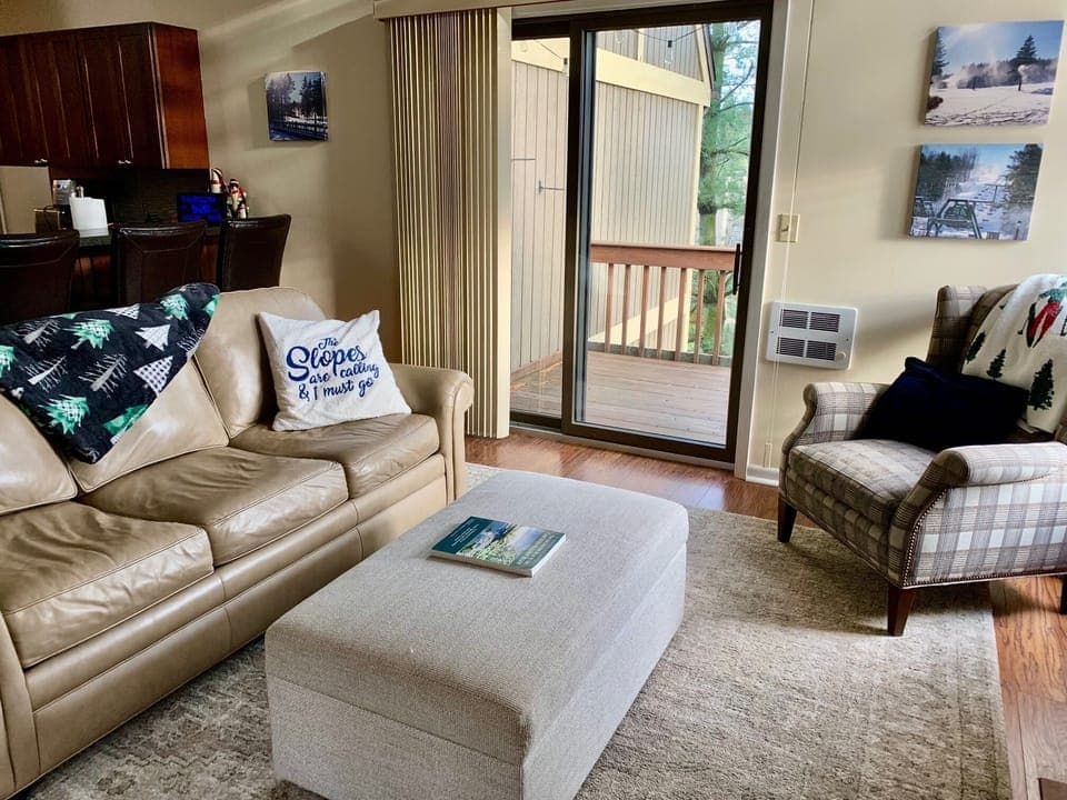 Main living area and access to private patio.