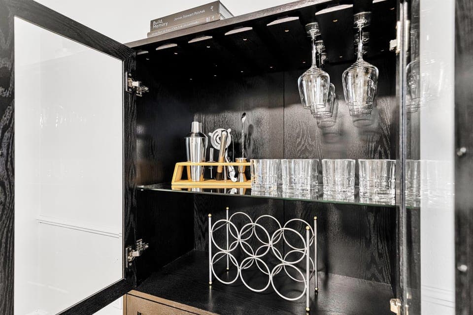 Mixology Corner: A stylish, well-appointed home bar, perfect for crafting your favorite cocktails.