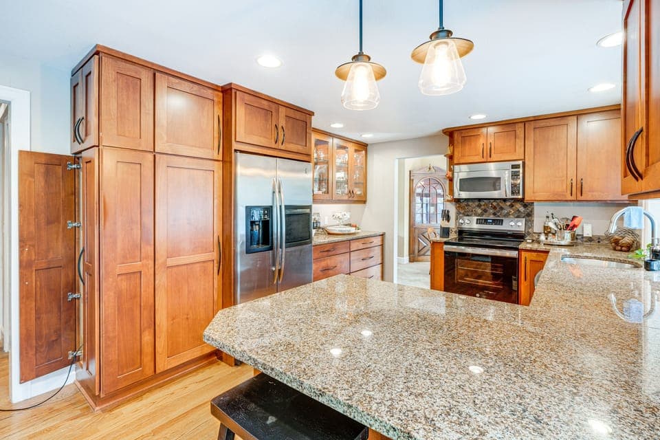 Spacious custom kitchen complete with all cooking and entertaining items