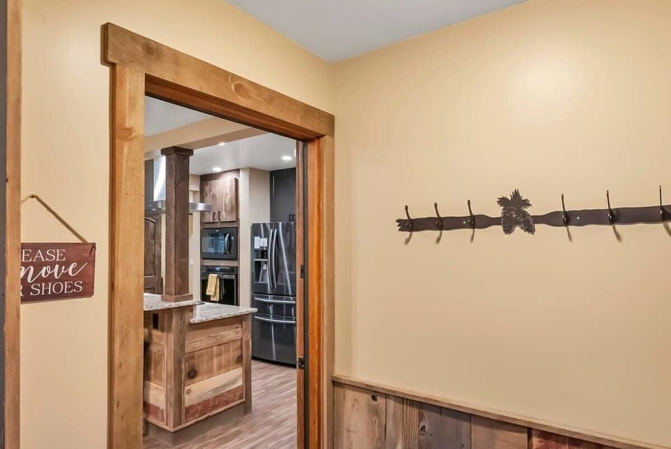 The kitchen and dining room await you at the front of the home.