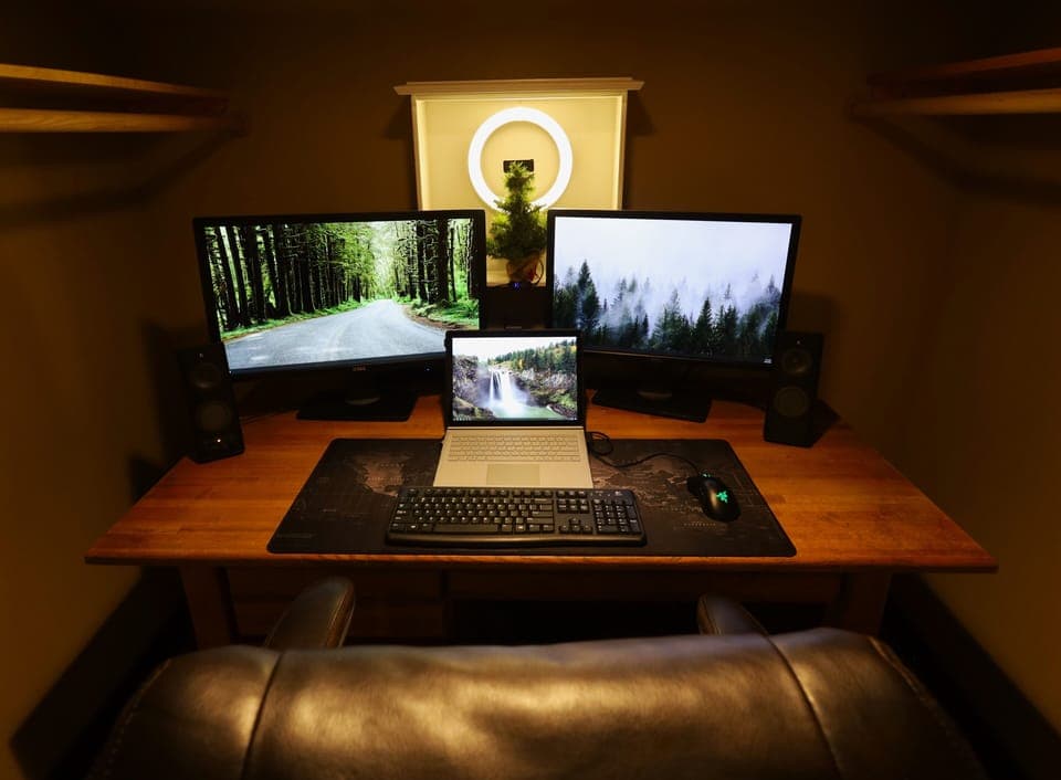 Workspace in upstairs storage room. 2 monitors, a dock, and PC provided. 