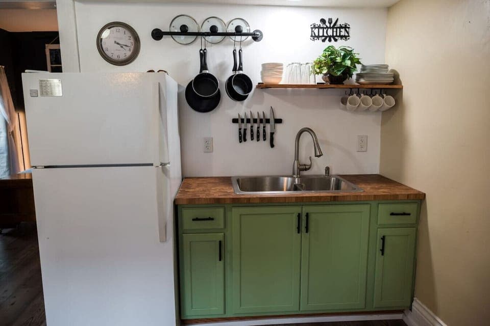 The kitchen is artfully decorated and optimized with space