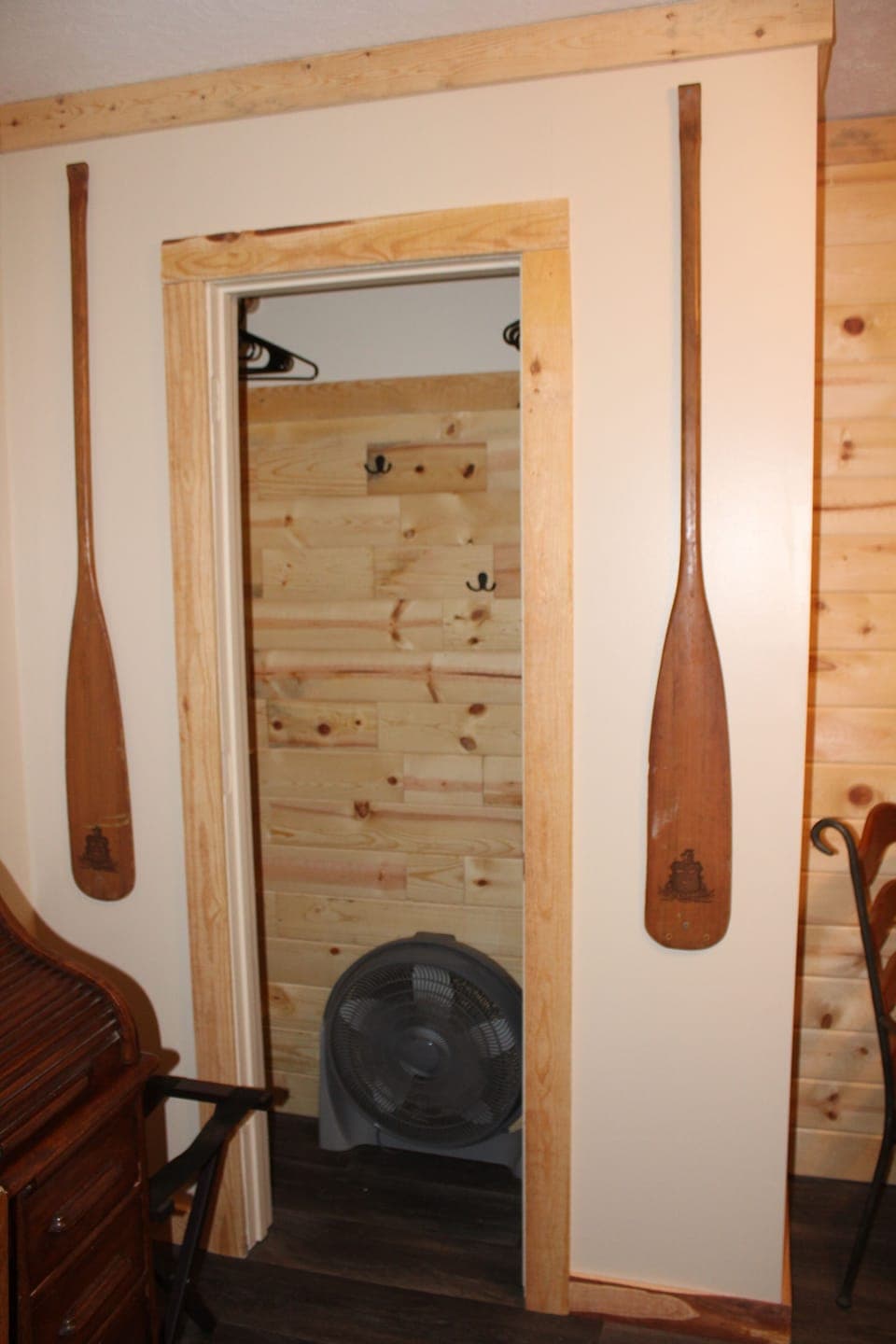 Closet with cubbies and hanging rack