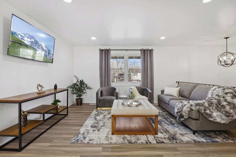 Embrace your family on the couch, laughter filling the room, creating a warm and cozy haven.