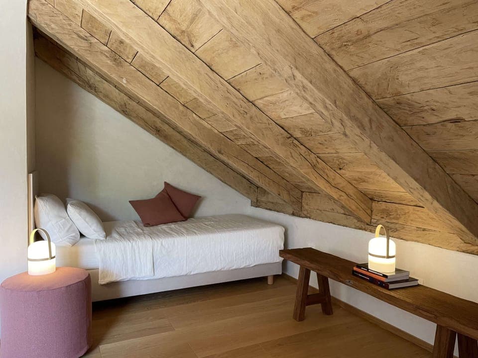 Well-appointed bedroom with flexible twin or double setup.