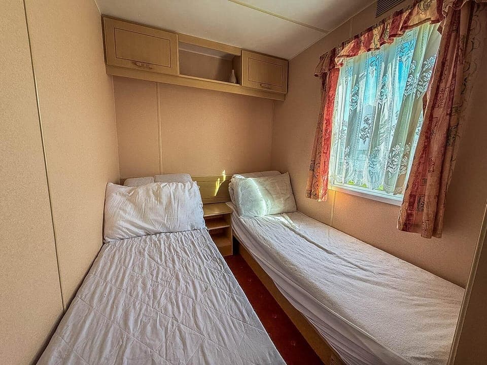 Two twin beds offers a perfectly cosy retreat for younger members of the family on your UK holiday.