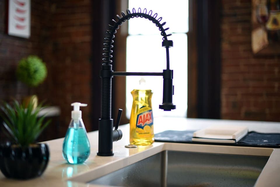 Clean & modern kitchen sink with handy essentials ready for you.