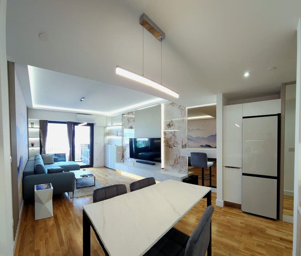 The main space consisted of the living room connected with an open space kitchen