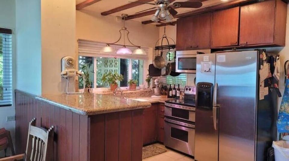 Kitchen with Granite Tops and Stainless Steel Appliances