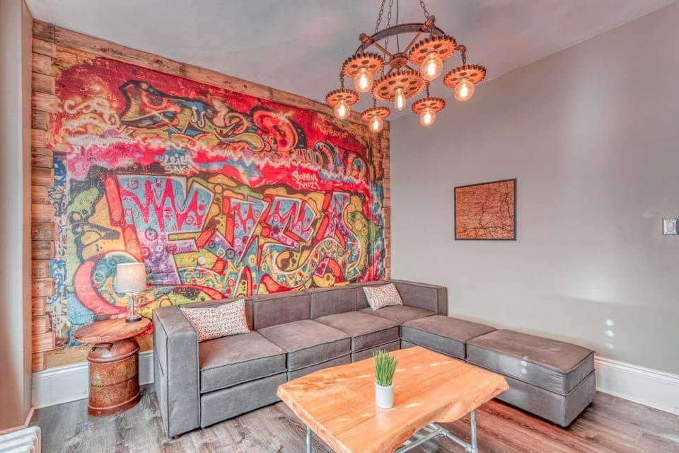 Comfortable sitting area w/ stylish decor &amp; natural light pouring through glass doors