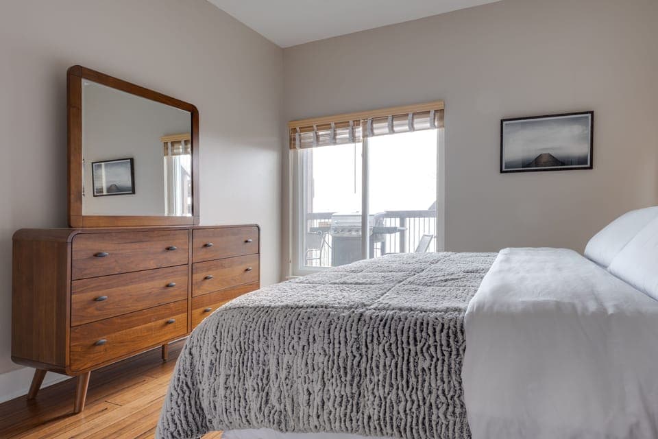 King Bed with a ton of nature light when you want it, blinds for when you don't!