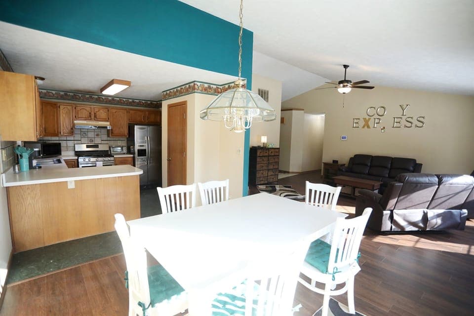 Dinette with kitchen to the left and Living Room to the right