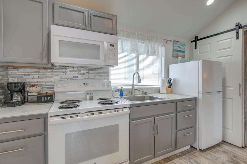 Contemporary kitchen with clean lines, neutral tones, and modern finishes.